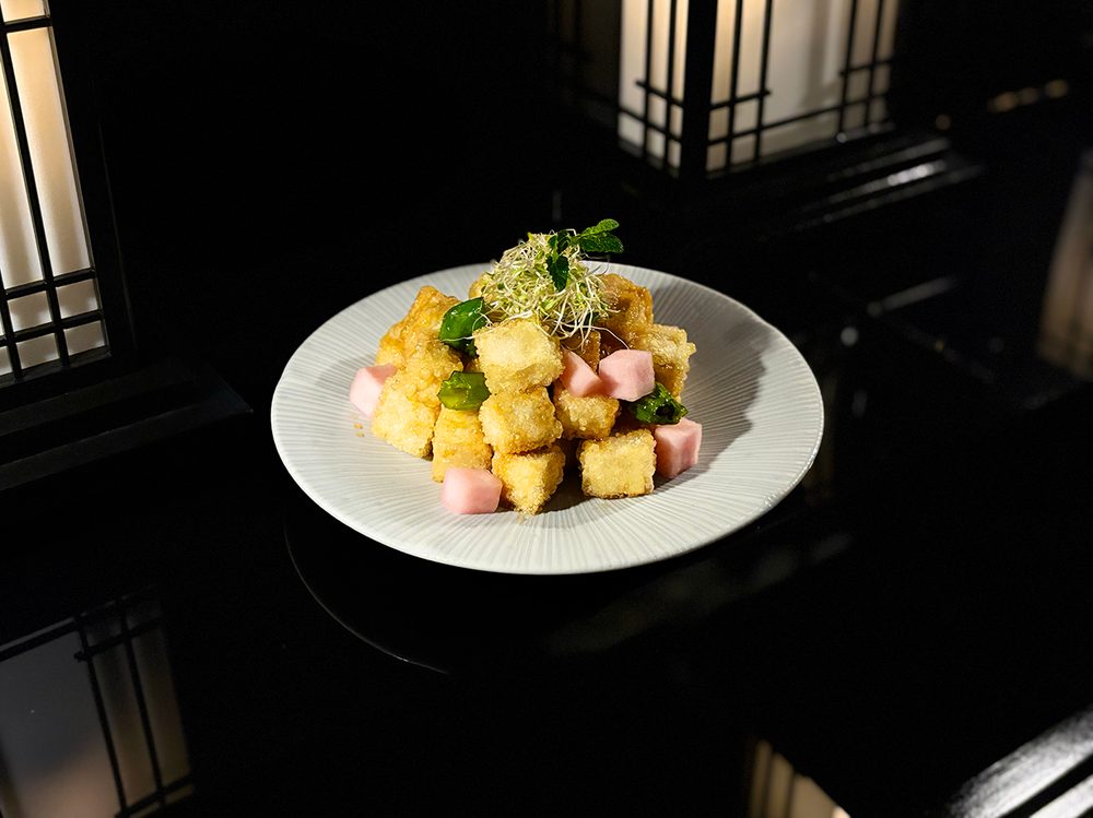 Tofu-Gangjeong — golden fried tofu cubes with shishito pepper and pickled radish